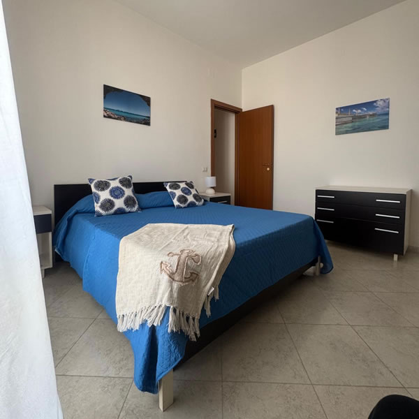 Camera da letto dell'appartamento Tridente a Trapani